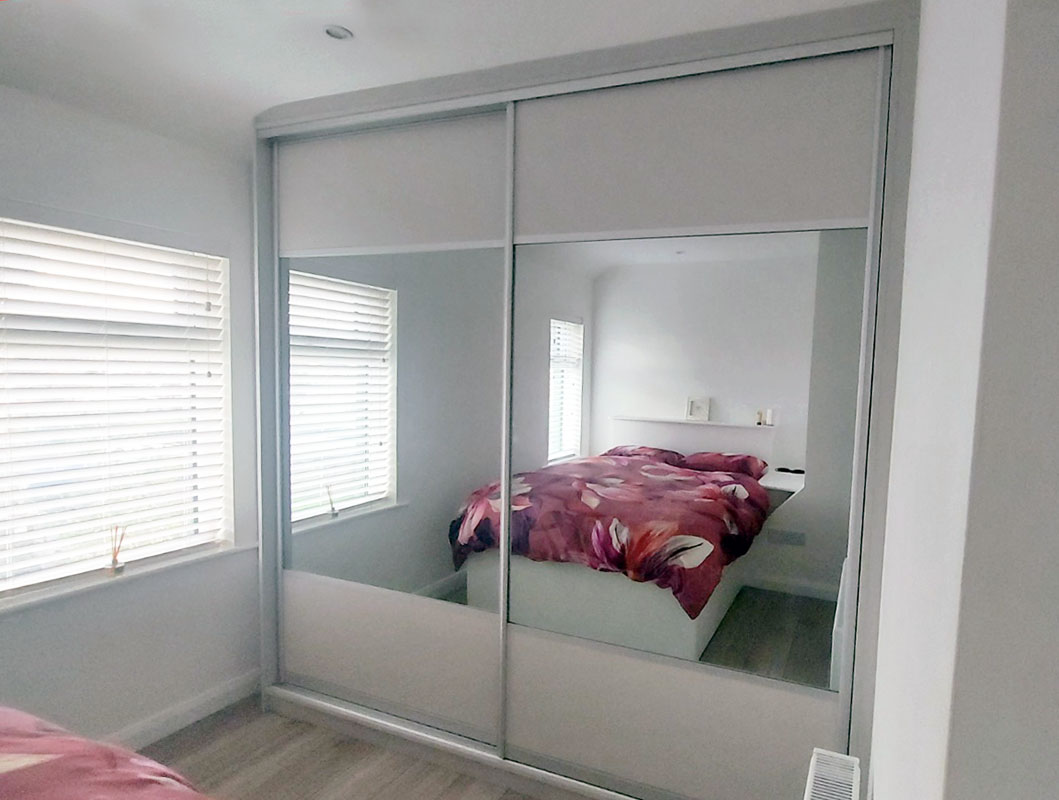 fitted bedroom with angled and sliding wardrobes 01