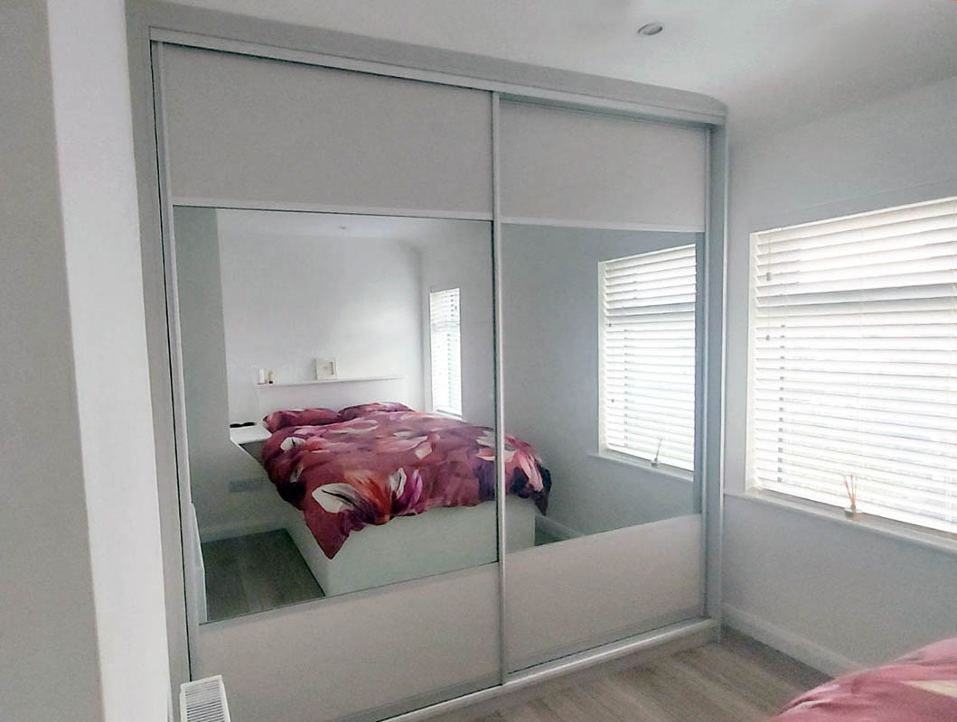 fitted bedroom with angled and sliding wardrobes 02